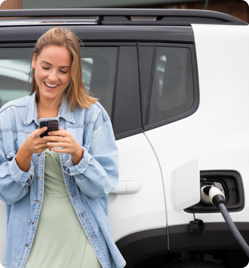 Woman leaning on car